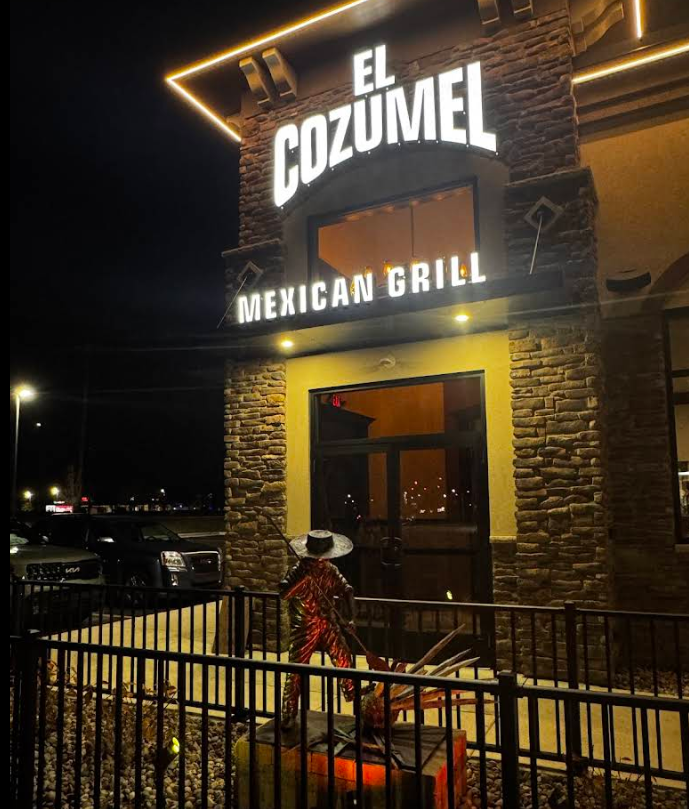 El Cozumel exterior sign at night
